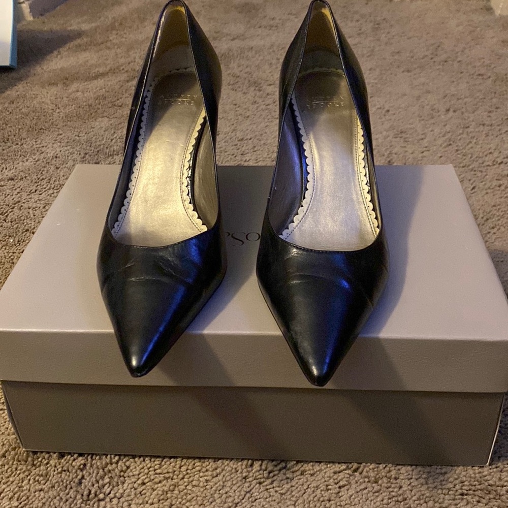 Black leather pumps by Audrey Brooke
